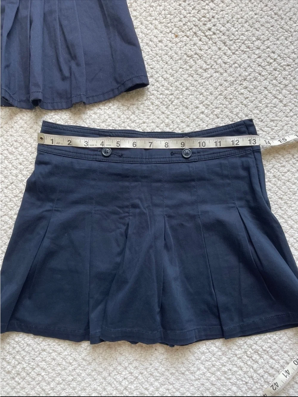 Two  skirts uniforms size 10